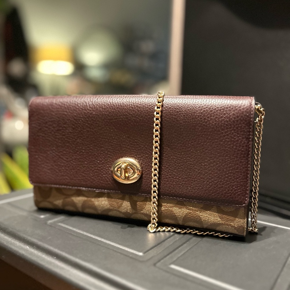 Black Coach Chain Crossbody In Brown. $298